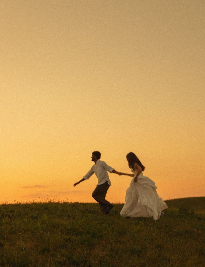 Two people in a golden field